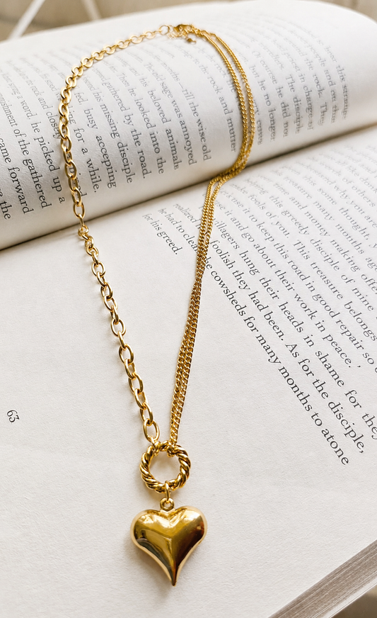 Asymmetrical heart pendant necklace