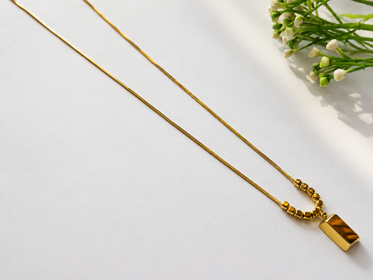 Gold bar chain pendant