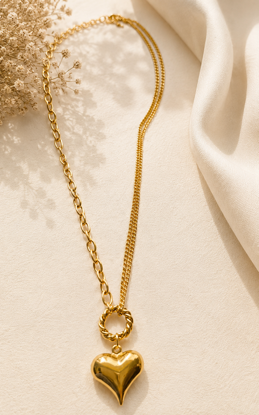 Asymmetrical heart pendant necklace