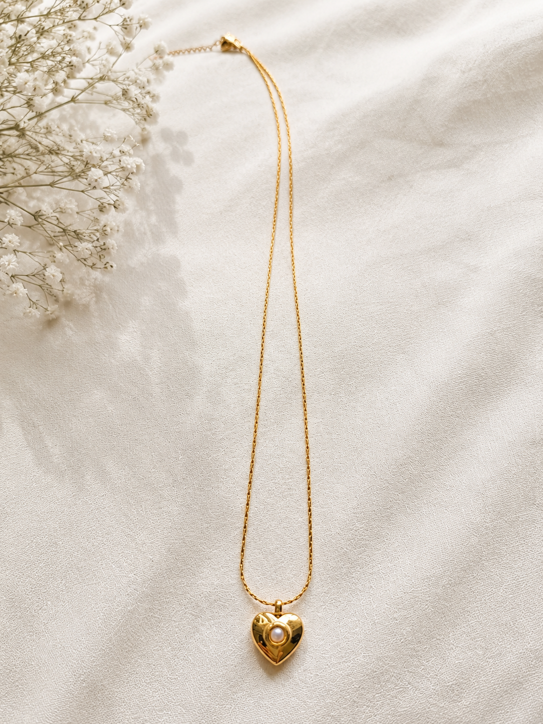 Small pearl heart pendant necklace